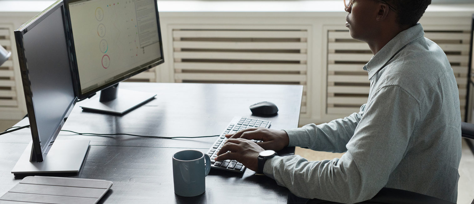 african-american-man-working-at-desk-2022-01-19-00-08-59-utc